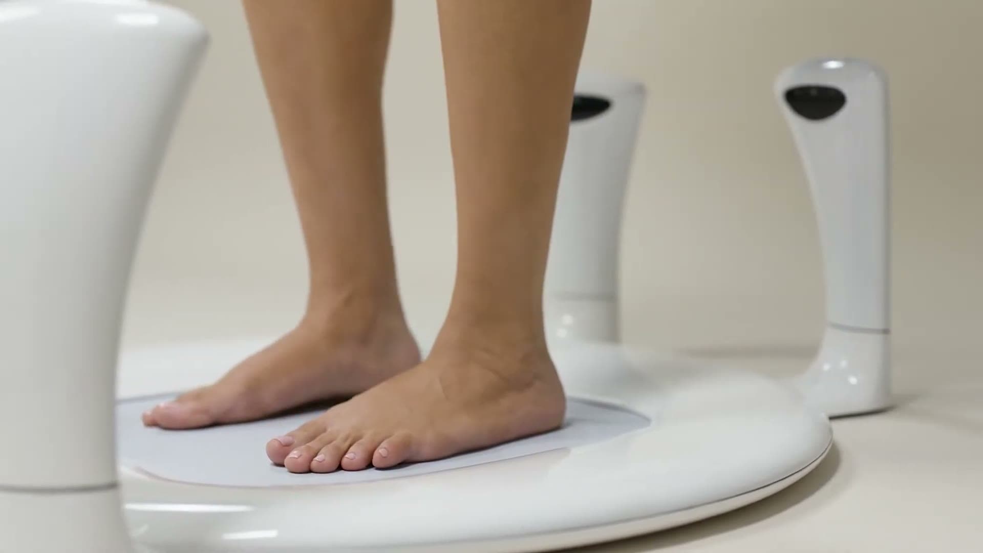 Patient's feet on the 3D foot scanner at MedRehab Professionals